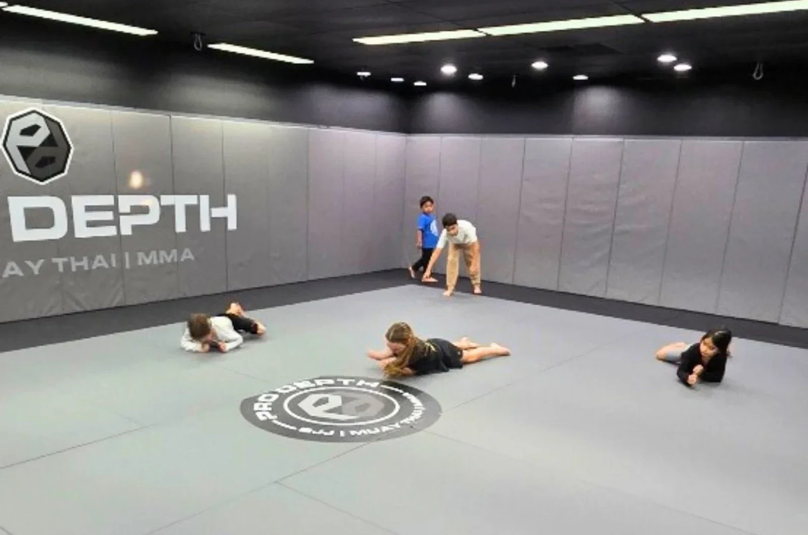 Child building confidence in martial arts